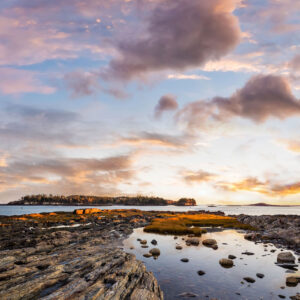 nearing sunset over tide pool with island in background