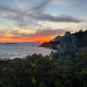 sunset behind lobsterman statue