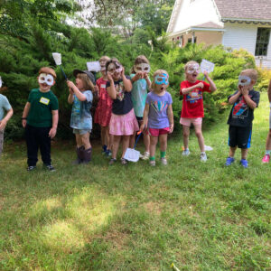 group of children in homemade masks