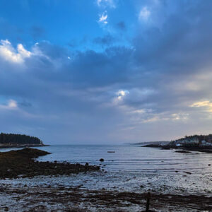 blue sky over low tide cove